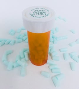 Pebble Beach mini suppositories packaged in a prescription vial